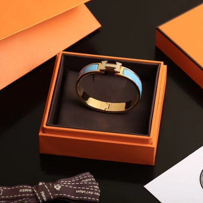 [AURORA]H CLOUD BLUE ARMBAND GOLD DIAMANT