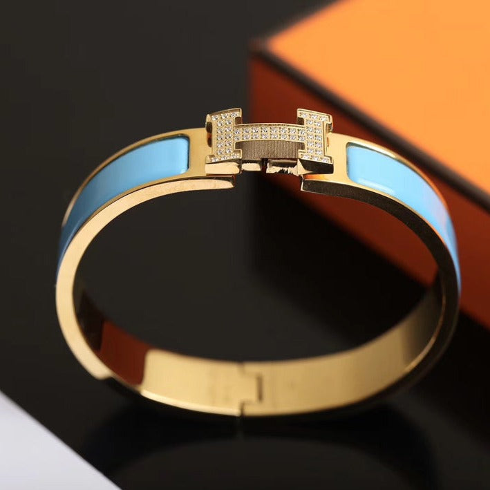 [AURORA]H CLOUD BLUE ARMBAND GOLD DIAMANT