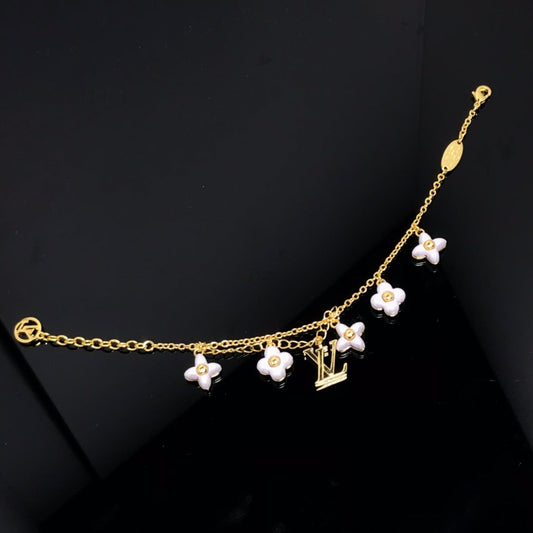 [Aurora]LOGO 6 MOTIF STAR AND SUN GOLD BRACELET