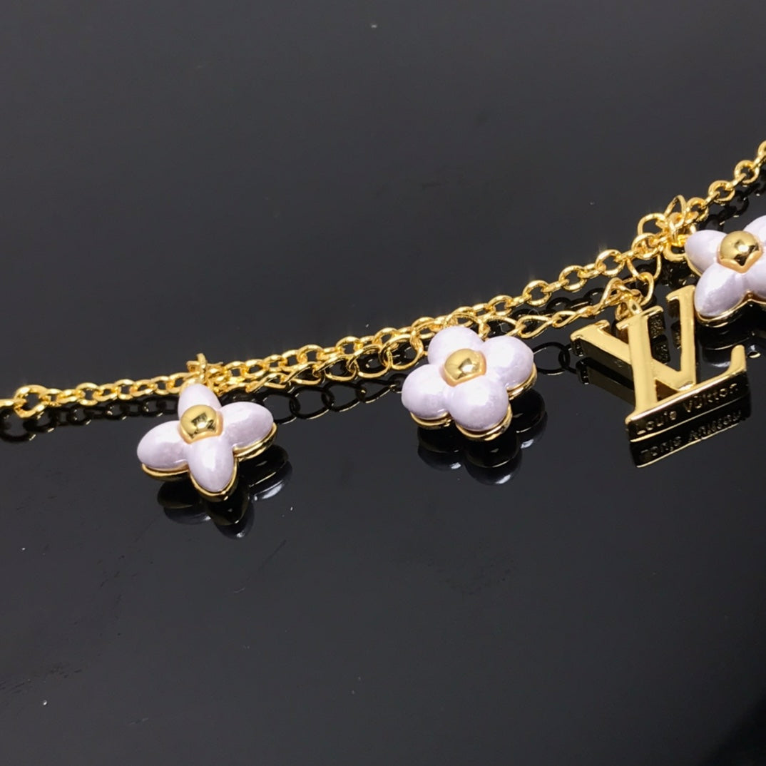 [Aurora]LOGO 6 MOTIF STAR AND SUN GOLD BRACELET