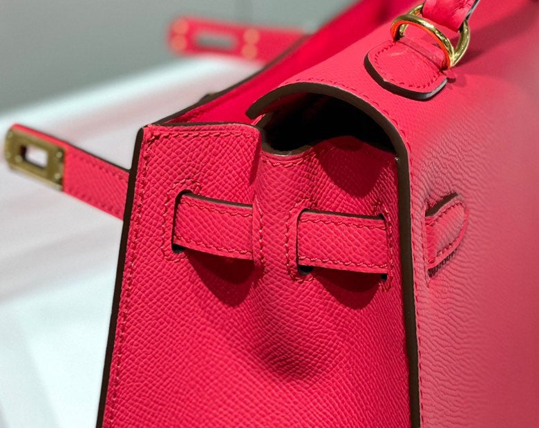 KELLY 25CM IN ROSE TYRIEN SWIFT CALFSKIN GOLD HARDWARE
