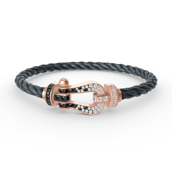 [AURORA]FORCE GROSSES HUFEISENARMBAND MIT SCHWARZ-WEISSEN DIAMANTEN UND ROSÉGOLD