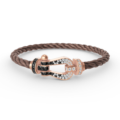 [AURORA]FORCE GROSSES HUFEISENARMBAND MIT SCHWARZ-WEISSEN DIAMANTEN UND ROSÉGOLD