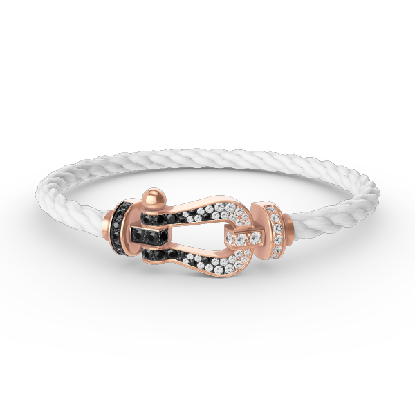 [AURORA]FORCE GROSSES HUFEISENARMBAND MIT SCHWARZ-WEISSEN DIAMANTEN UND ROSÉGOLD
