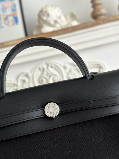 ZIP CABINE 31 BAG IN BLACK CANVAS AND CALFSKIN