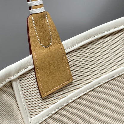 STEEPLE 28 BAG IN OFF-WHITE MIX PERSIAN PLUM RED CANVAS AND BROWN SWIFT LEATHER