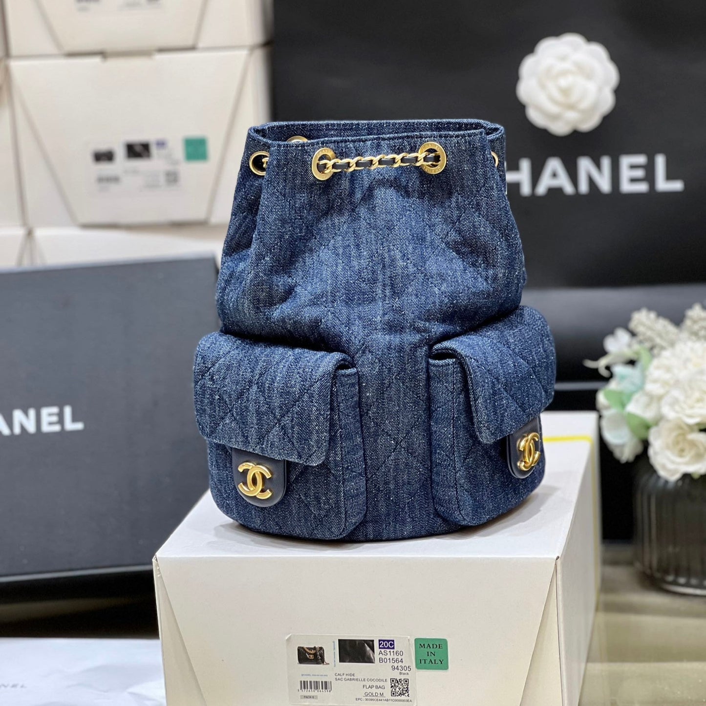 DRAWSTRING BUCKET BACKPACK 24 IN DARK BLUE DENIM GOLD HARDWARE