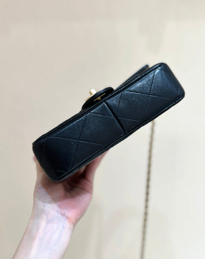 PEARL LIMITED EDITION FLAP BAG WITH HANDLE 20 IN BLACK LAMBSKIN